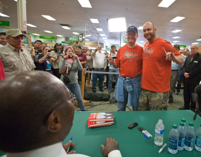 Two men in burnt orange 