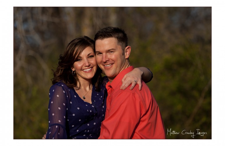 Couple poses for an engagement portrait